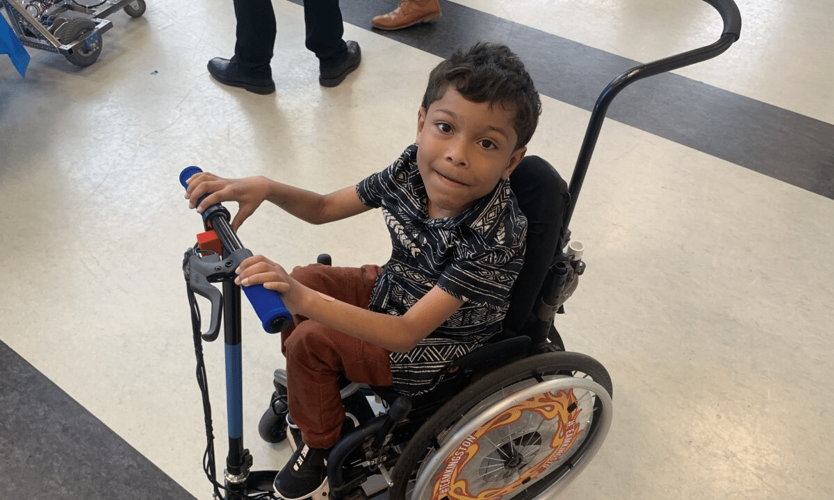 Inclusivity and super speed: West Michigan Aviation students engineer scooter for boy with SMA