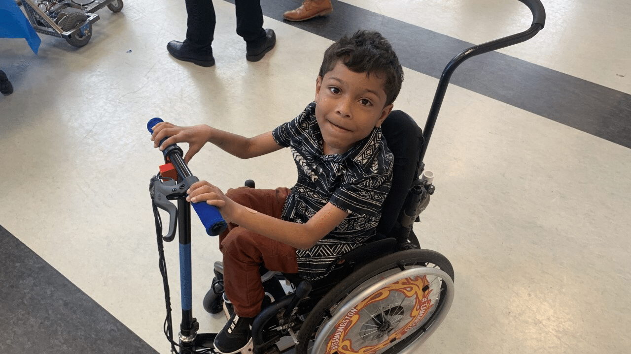 Inclusivity and super speed: West Michigan Aviation students engineer scooter for boy with SMA